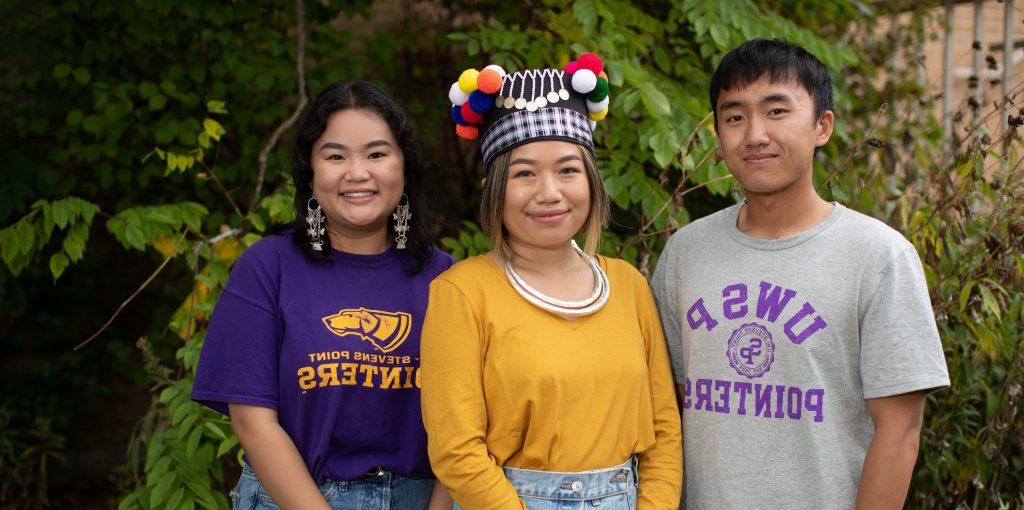 Three members of the Hmong and Southeast Asian American Club.